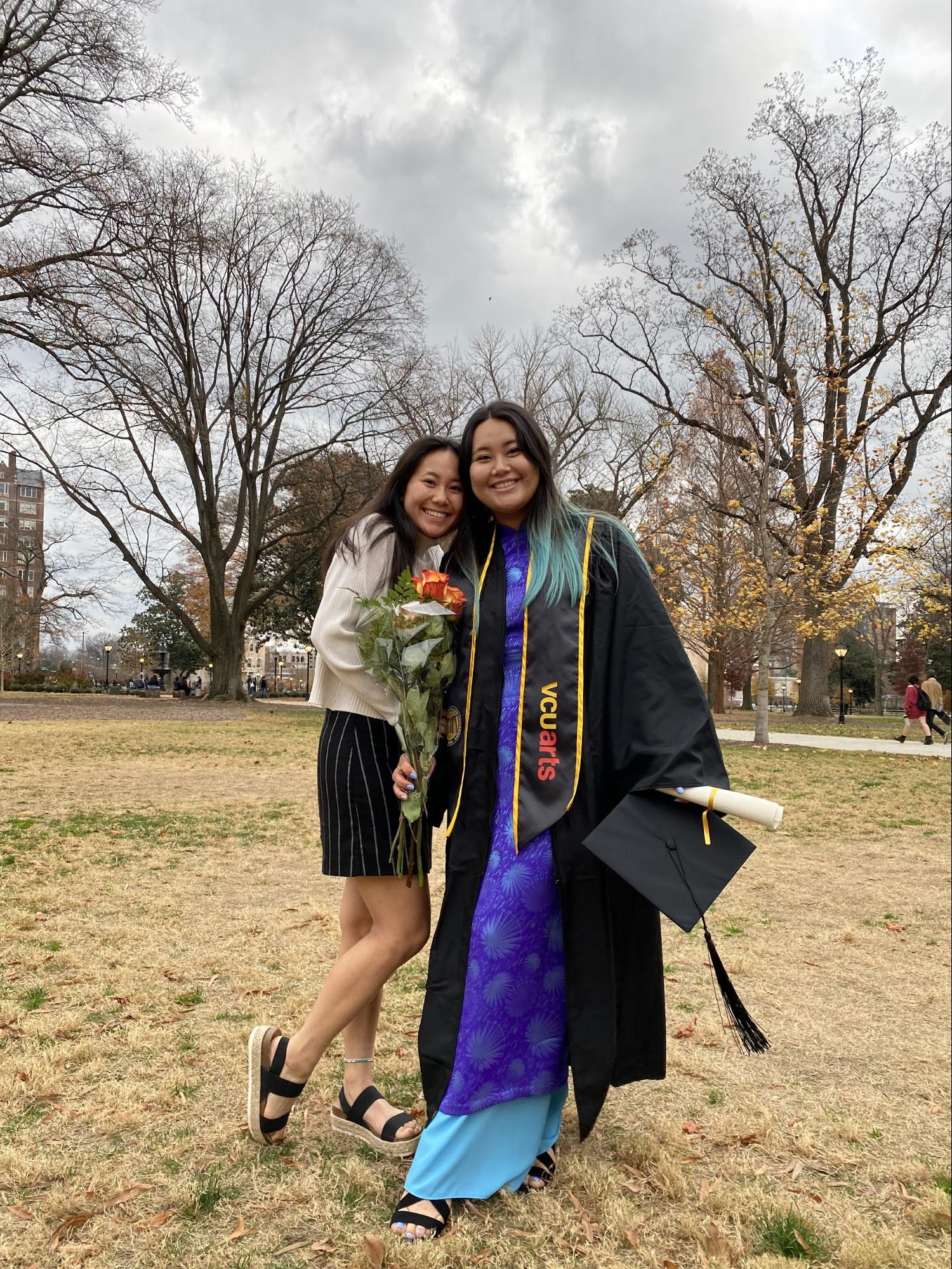 Tracy with her sister at her sister's graduation