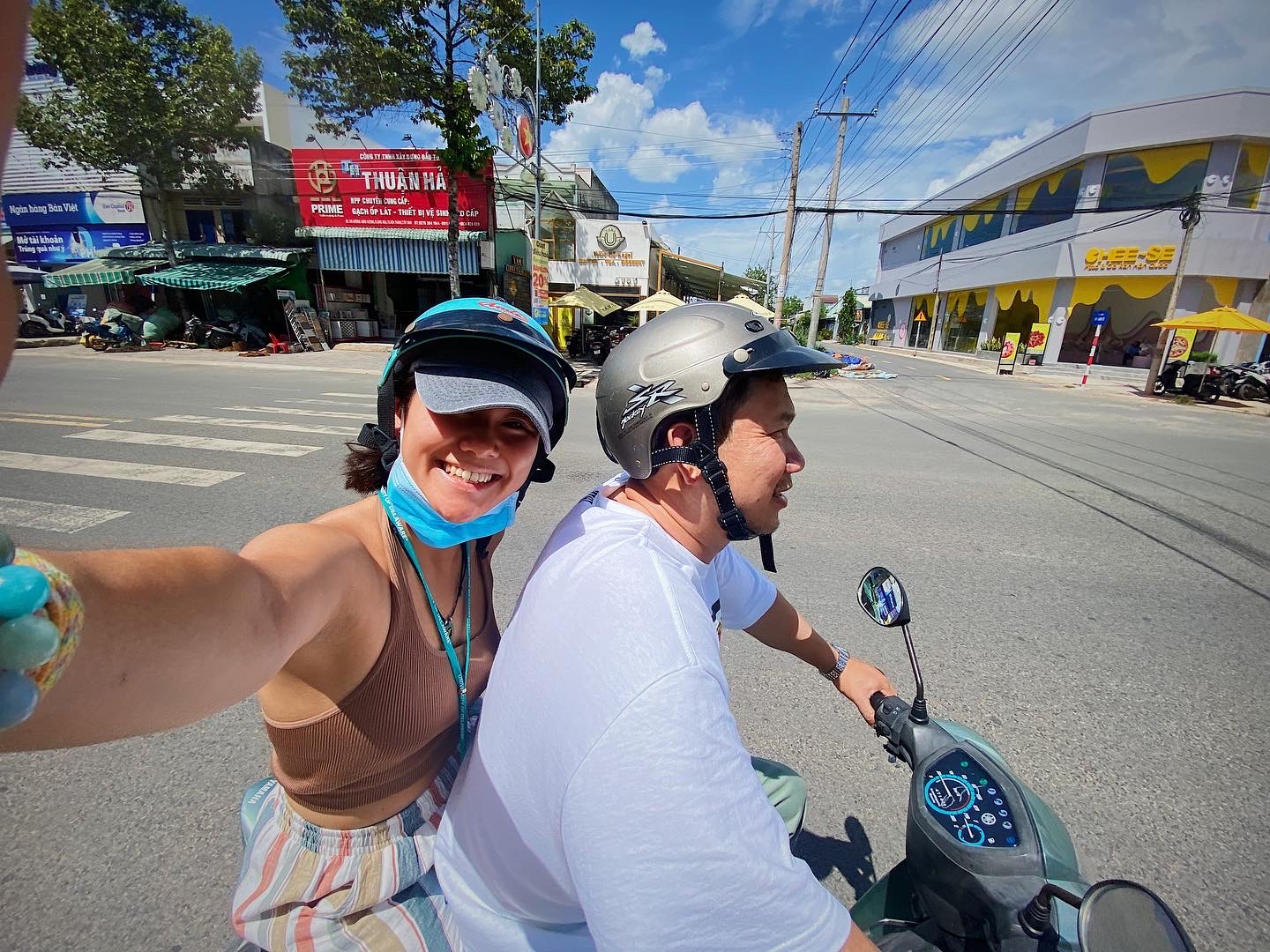 Tracy on a moped with her dad